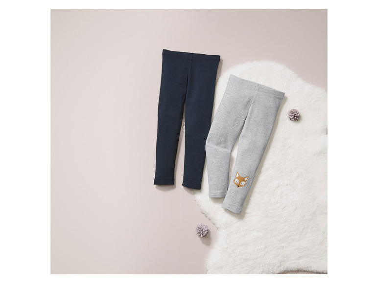 Schwarze und graue Leggings für Kinder mit einem Fuchs-Motiv.