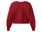 Ein roter Pullover mit langen Ärmeln.