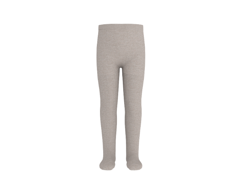 Hellbeige gerippte Kinderstrumpfhose auf schwarzem Hintergrund.