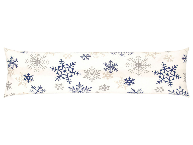 Ein langes Kissen mit einem winterlichen Schneeflockenmuster.