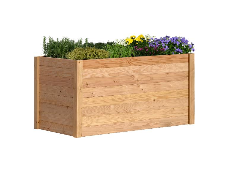Hochbeet aus Holz mit verschiedenen Kräutern und bunten Blumen