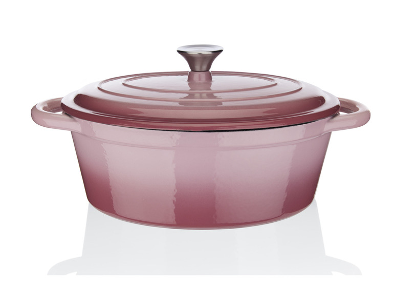 Ein rosa gusseiserner Topf mit Deckel.