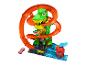 Hot Wheels Spielset mit grünem Dinosaurier und oranger Strecke.