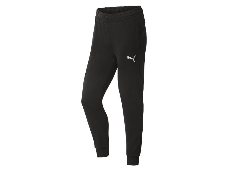 Schwarze Jogginghose mit elastischem Bund und gerippten Bündchen.