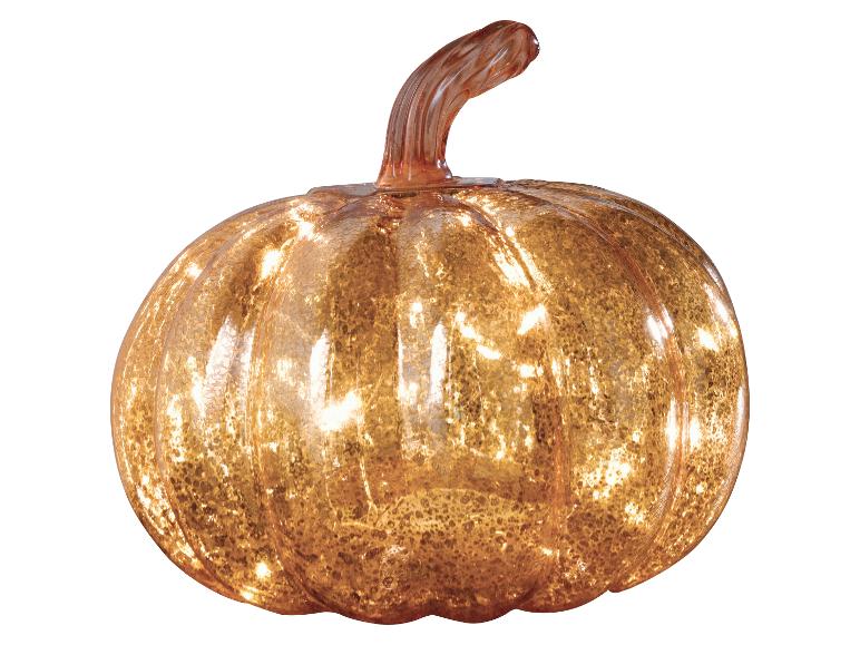 Ein dekorativer Glas-Kürbis mit warmem, leuchtendem Glanz, perfekt für die Herbstdekoration.