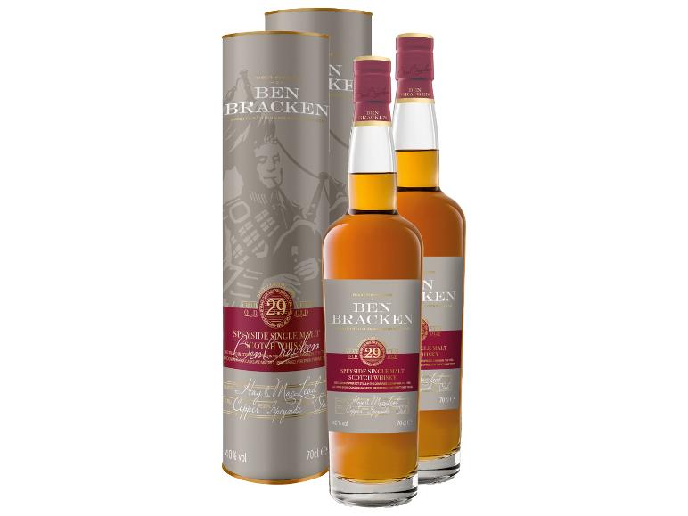 Zwei Flaschen 29 Jahre alten Single Malt Scotch Whisky in Kartonzylindern.