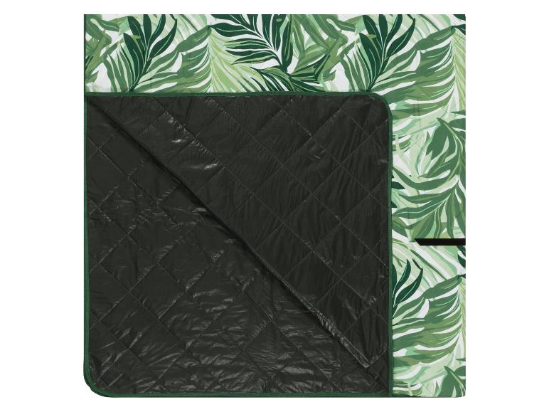 Gepolsterte Picknickdecke mit tropischem grünem Blattmuster.