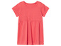 Ein rosafarbenes Kleid für Mädchen mit kurzen Ärmeln.