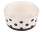 Weiße Keramik Schüssel mit schwarzen Punkten.