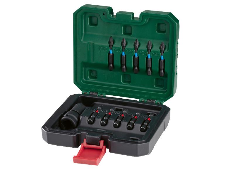 Ein Satz Schraubendreherbits in einem grünen Koffer.