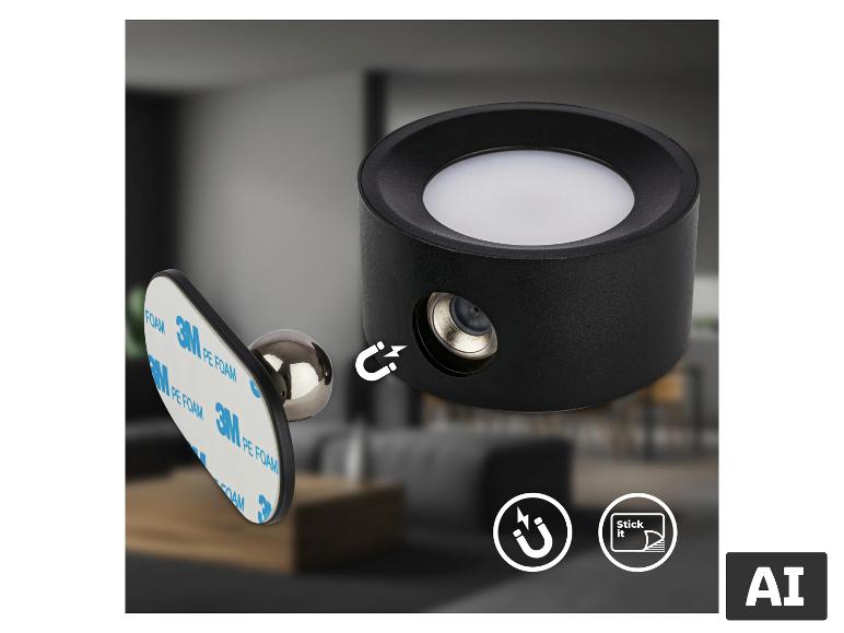 Schwarze magnetische LED-Leuchte mit weißem Diffusor, gezeigt mit ihrer selbstklebenden Magnetbasis.