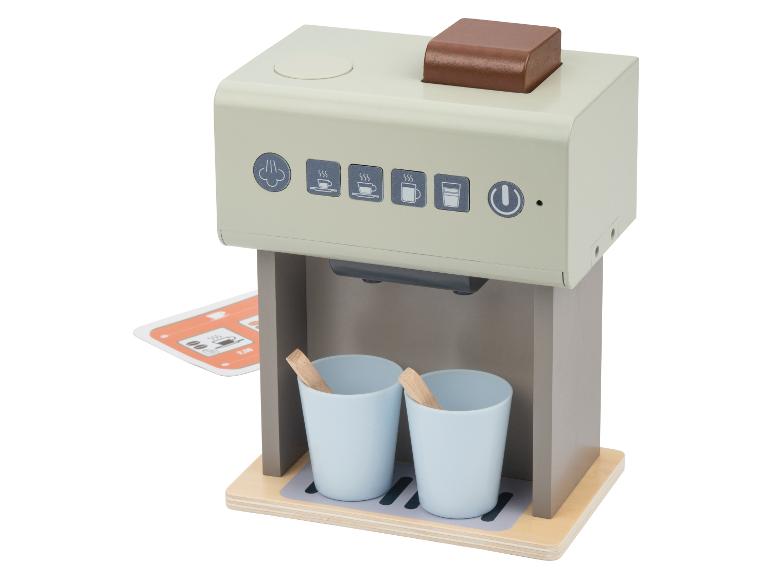 Hölzerne Spielzeug-Kaffeemaschine mit zwei Tassen und Zubehör.