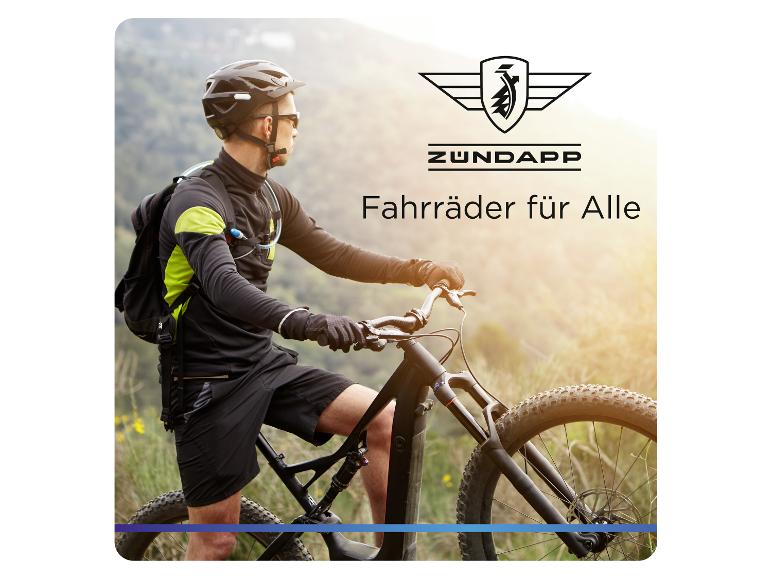 Mann auf einem Mountainbike in der Natur, mit dem Text „Fahrräder für Alle“.