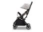 Leichter und kompakter beiger Kinderwagen mit schwarzem Gestell
