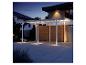 Beleuchteter Carport in der Dämmerung, zeigt moderne Außenbeleuchtung und Design.