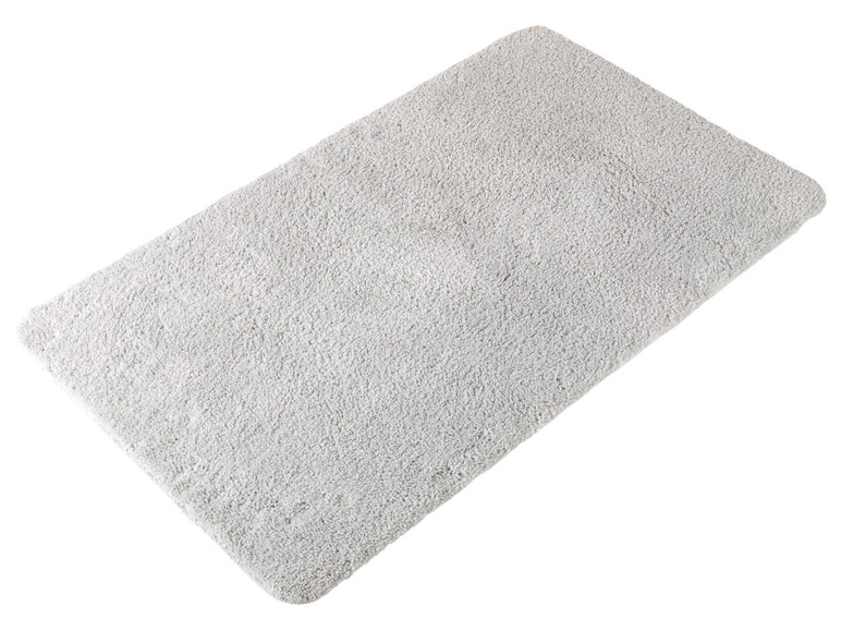 Ein graues Frottee-Badematten.