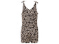 Ein beiger Jumpsuit mit schwarzem geometrischen Muster.