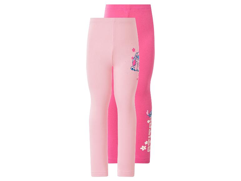Zwei rosa und fuchsia Kinderleggings mit Cartoon-Print.