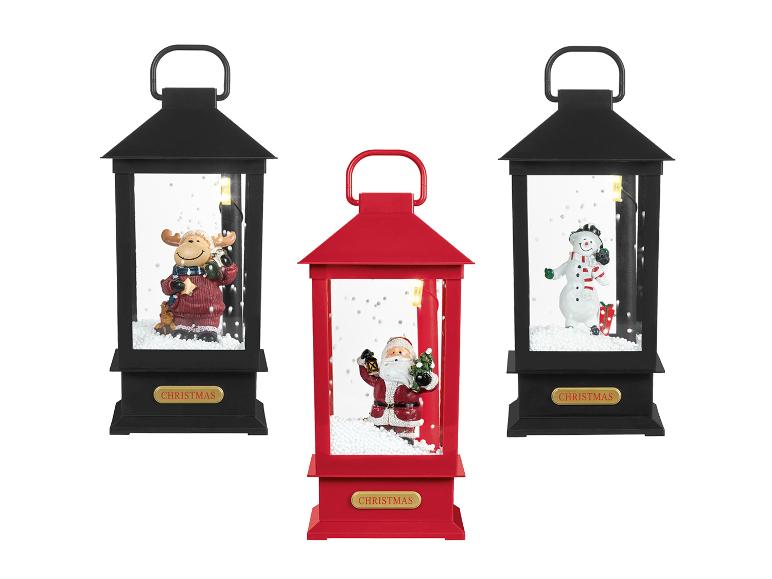 Weihnachtslaternen mit Rentier, Schneemann und Weihnachtsmann.