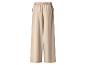 Beige weite Hose mit elastischem Bund und Seitentaschen.