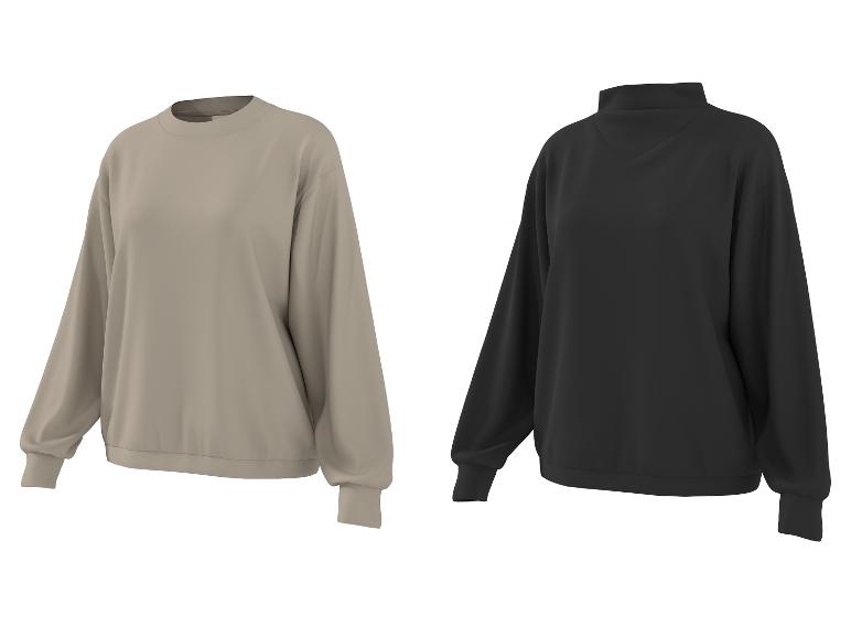 Zwei einfarbige Sweatshirts, ein beiges Rundhals- und ein schwarzes Stehkragen-Modell.
