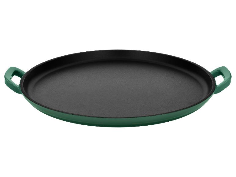 Grüne Gusseisen-Paella-Pfanne mit schwarzer Innenseite.