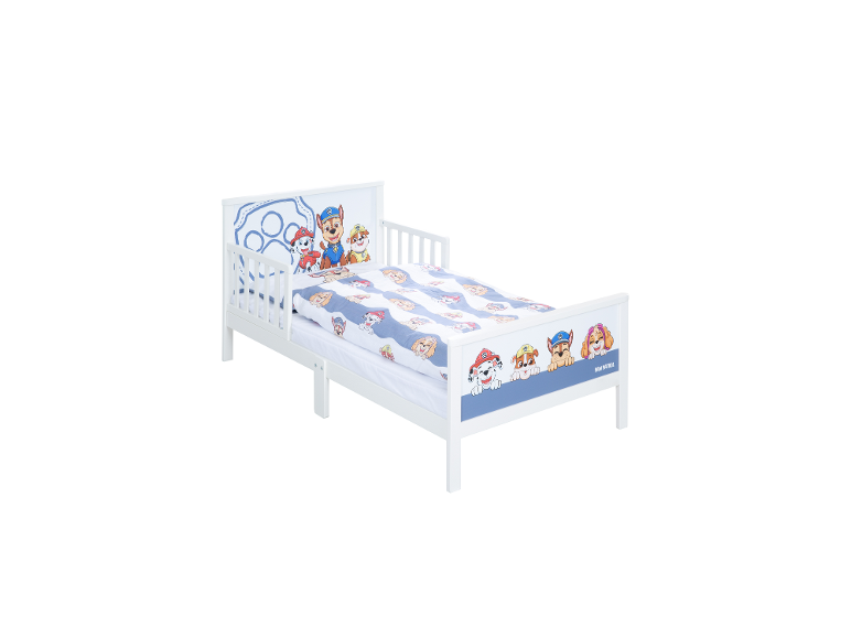 Weißes Kleinkindbett mit Cartoon-Hundfiguren und blauem Pfotenabdruck-Design.