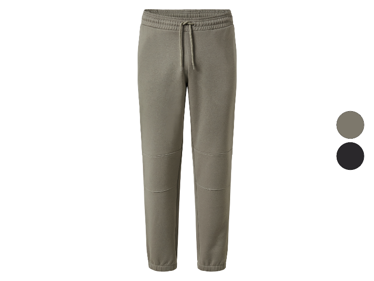 Jogginghosen in Beige und Schwarz.