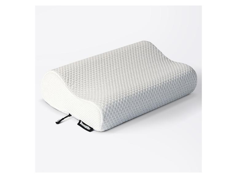 Weißes Konturkissen mit strukturierter Oberfläche zur Nackenstütze.