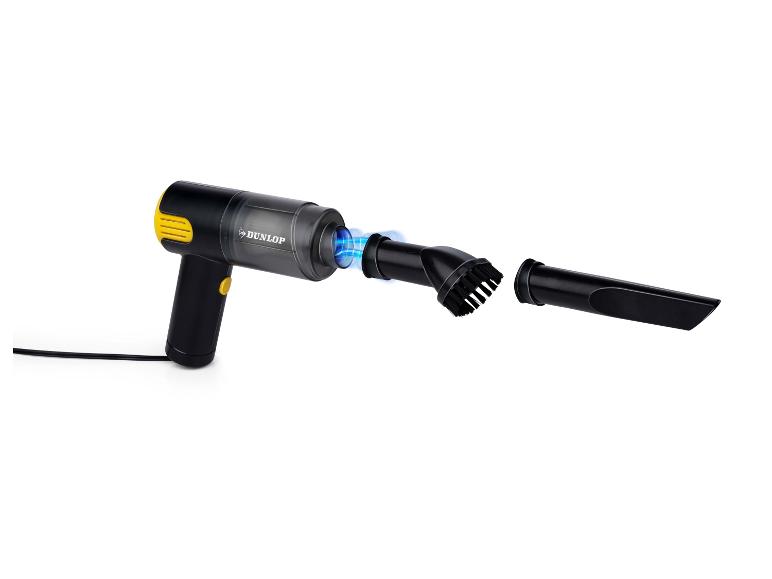 Schwarz-gelber Handstaubsauger mit zwei Aufsätzen und blauem Lichteffekt