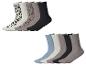 Zehn Paar Socken, fünf mit Leopardenmuster und fünf unifarben, in neutralen Tönen.