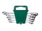 Satz Ratschenschlüssel in grüner Halterung.