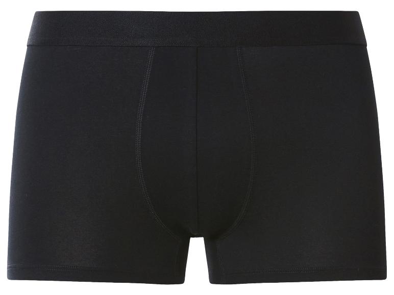 Schwarze Herren-Boxershorts mit elastischem Bund und sichtbaren Nähten.