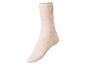 Ein Paar weiche, beige Socken.