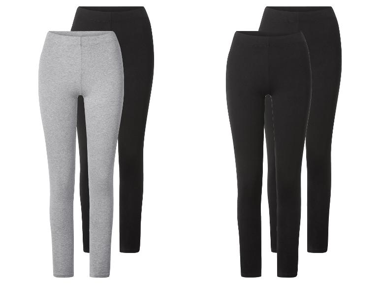 Zwei Paar Leggings: eine graue und eine schwarze, plus zwei Paar schwarze Leggings.