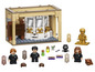 LEGO Harry Potter Set mit Minifiguren von Harry, Ron, Hermine und einer goldenen Harry-Statue.
