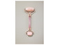 Ein rosa Jade-Roller für Gesichtsmassage.