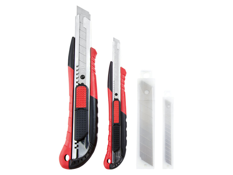 Zwei rote Stanleymesser und Ersatzklingen.