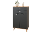 Schwarzer Schrank mit Schubladen und Türen, mit Holzplatte und Beinen, verziert mit Vase und Seifenspender.