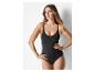 Schwarzer Body und Jumpsuit, minimalistischer Stil.