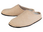Zwei Paar beige Wollpantoffeln mit schwarzem Rand.