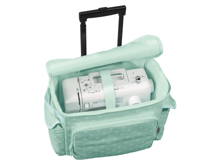 Eine mintgrüne Nähmaschinentasche mit einer weißen Nähmaschine und Rollen.