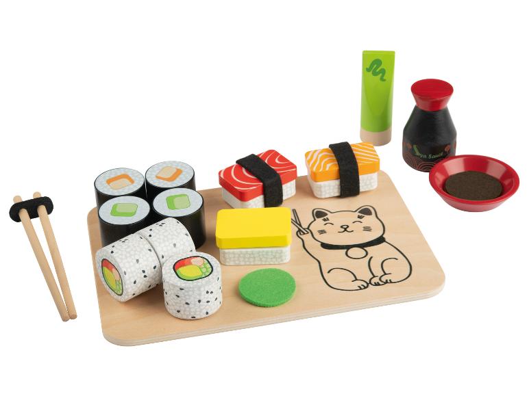 Hölzernes Sushi-Spielset mit Rollen, Soßen und Stäbchen.