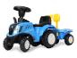 Blauer New Holland Spieltraktor mit gelber Schaufel.