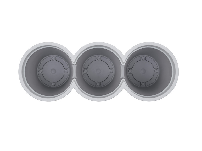 Drei graue Töpfe zum Pflanzen von Blumen oder Kräutern.