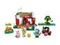 Ein LEGO Animal Crossing Set mit Haus, Figuren und Nähzubehör.