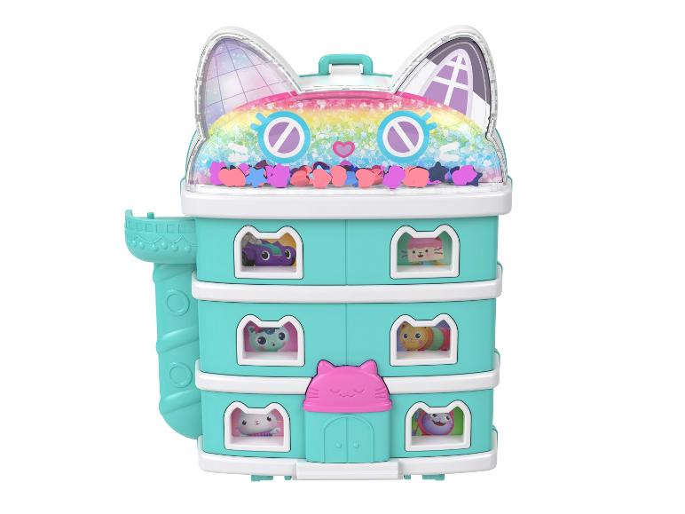 Ein Gabby's Dollhouse Spielzeug in Form eines Katzenkopfes mit mehreren Etagen und kleinen Figuren.