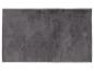 Grauer, rechteckiger Teppich aus weichem Kunstfell.