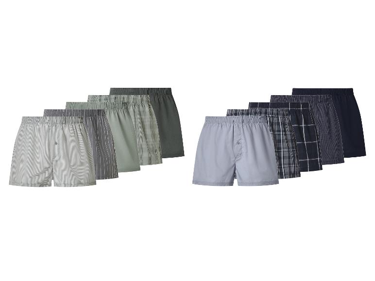 Ein Set aus 10 Herren-Boxershorts in verschiedenen Grün-, Grau- und Blautönen und Mustern.