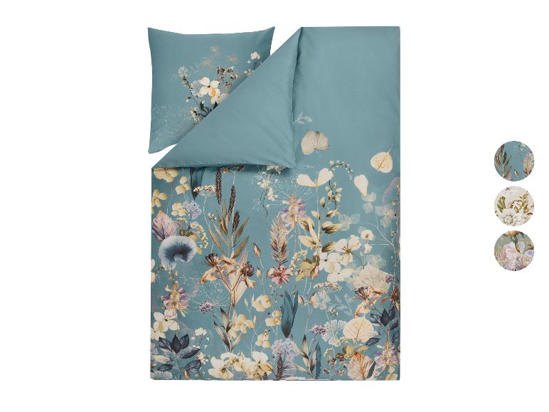 Bettwäsche-Set mit Kissenbezug, mit Blumenmuster auf türkisfarbenem Hintergrund.